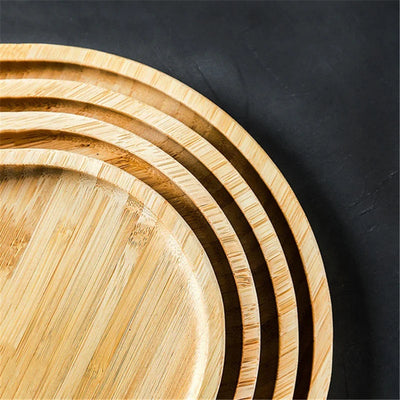 Bamboo Round Serving Tray Eco-Friendly Wooden Board with tea set and pastries for serving.