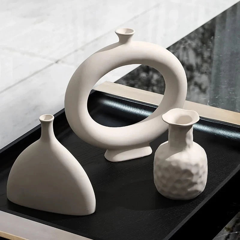 Minimalist desktop flower arrangement in modern ceramic vase