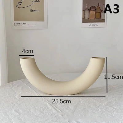 Stylish home décor and flower display on living room shelf