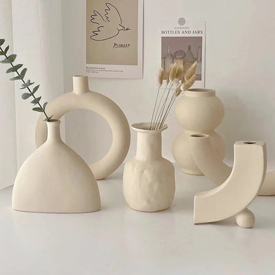 Minimalist desktop flower arrangement in modern ceramic vase