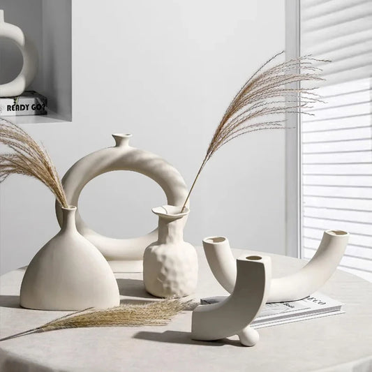 Minimalist desktop flower arrangement in modern ceramic vase